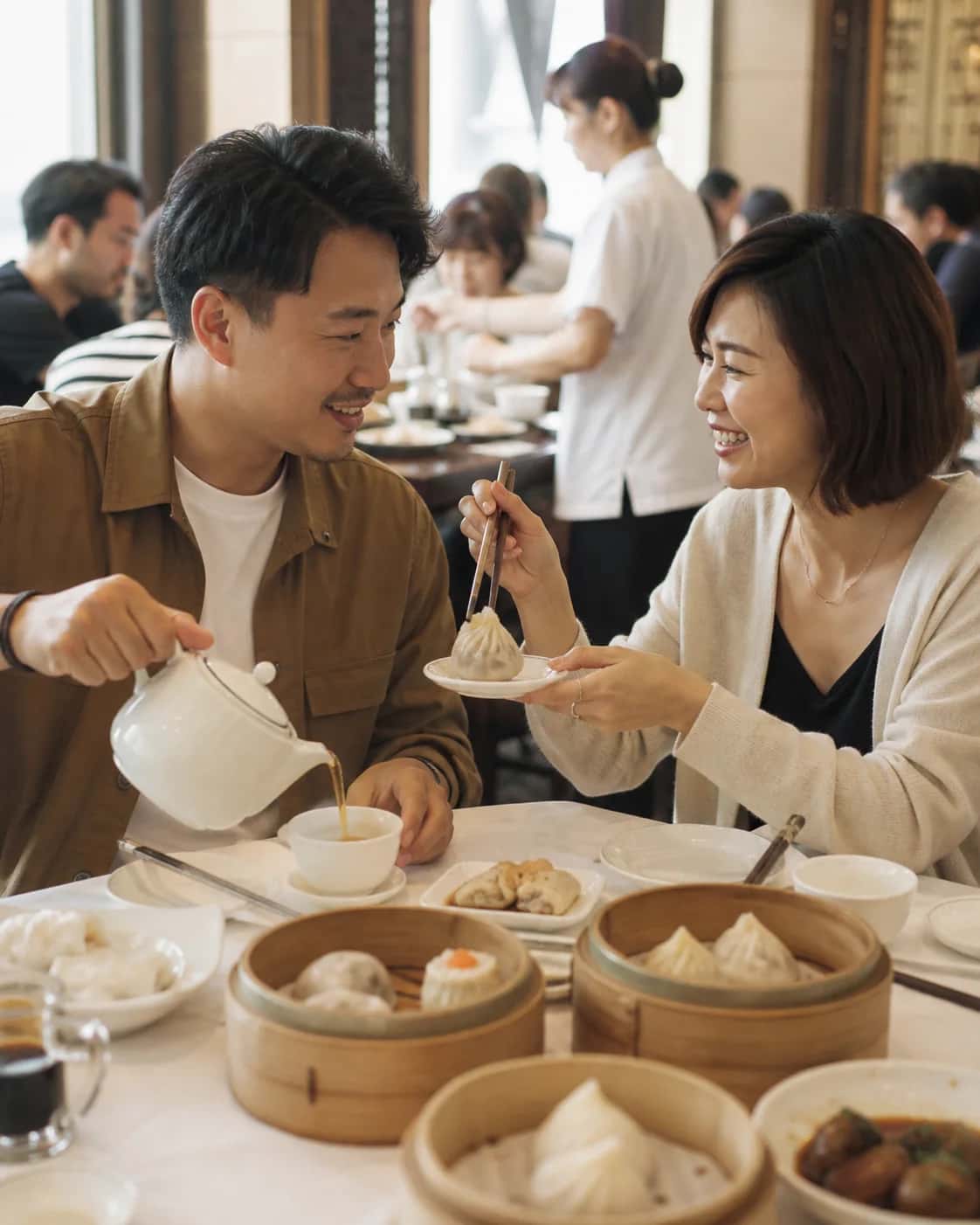 Illustrative Hong Kong dim-sum scene with adults planning a cross-border connection; not a member photo.