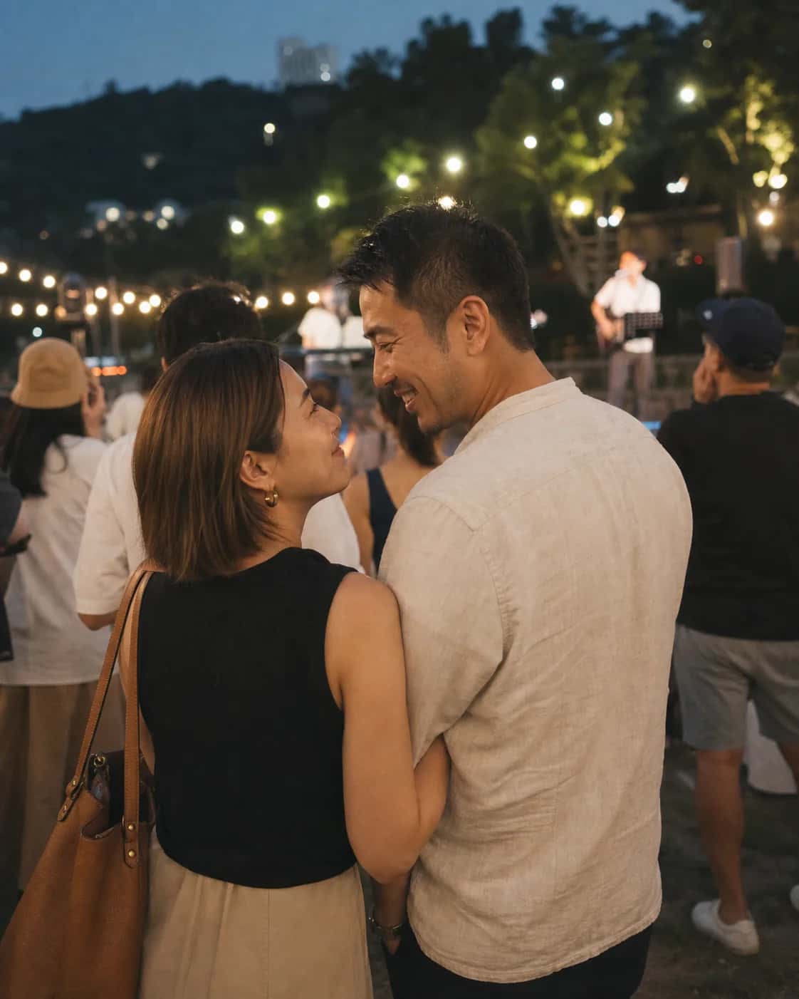 Illustrative Hong Kong outdoor-music scene of adults considering relationship direction; not a member photo.